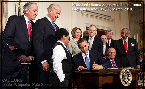 PRESIDENT OBAMA SIGNS HEALTH INSURANCE